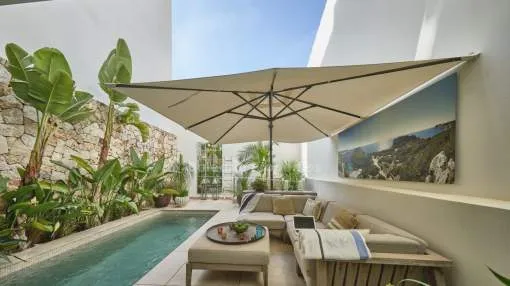 Casa adosada nueva con piscina en venta en Portocolom, Mallorca