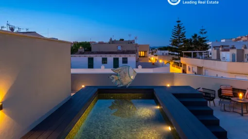 Elegante casa adosada con terraza en la azotea y piscina en El Molinar